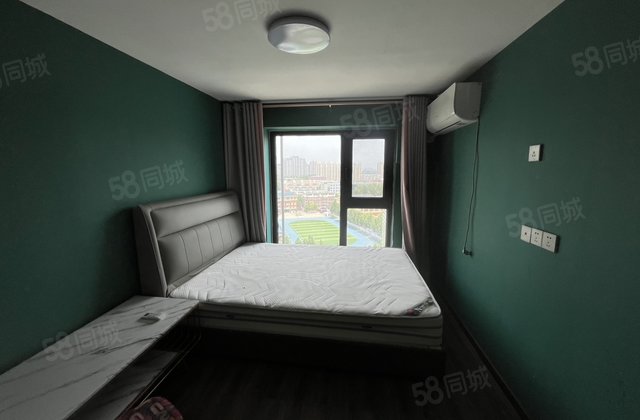 买一层住两层，二中对过，电梯 60 平，精装修 可按揭有钥匙