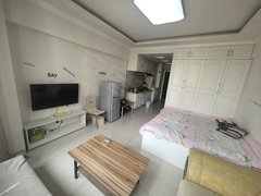 乌海滨河东区宜化广场宜化公寓电梯18楼精装,年租1.5万包取暖物业费。出租房源真实图片