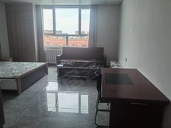 张掖甘州中心广场美意家公寓位于张火公路东部建材市场对面，水泥路50米处出租房源真实图片