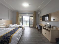 防城港港口桃花湾广场中央第一街，民宿配套公寓双人床，拎包入住多套房源出租房源真实图片