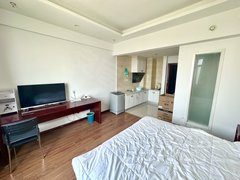 威海荣成荣成市区多套可短租佳华财富公寓可押一付一拎包入住，免费网络24热水出租房源真实图片