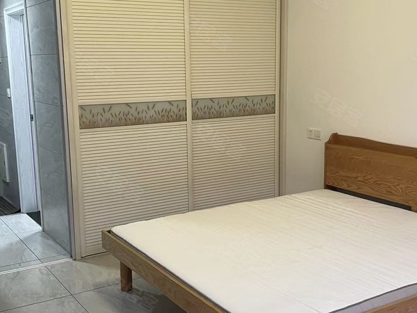 金华武义县武义城北壶山广场(商住楼)壶山广场单身公寓，一室一厅一厨一卫出租房源真实图片