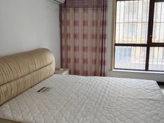 乐陵城区新一中出租,中央世纪城步梯二楼两室两厅一卫家具家电齐全,10500出租房源真实图片
