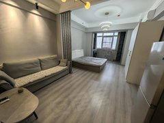 乌海滨河东区宜化广场摩尔城精装公寓电梯11楼阳面房，年租1万6包取暖物业费。出租房源真实图片