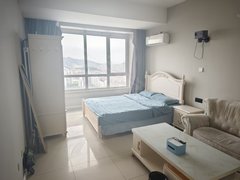 青岛市北中央商务区在万达的精装套一靠近商圈附近吃喝娱乐方便交通便利快捷出租房源真实图片