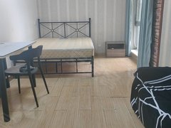 海口龙华世贸万象城附近男生公寓房,900元押一付一。可短租。新家具。出租房源真实图片