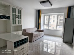 蓬莱登州南关路凤凰广场电梯2室70平1300元，2个空调出租房源真实图片