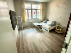 乳山市区商业街东山小区一楼66平，带小院家具家电齐全有空调年租1000月出租房源真实图片