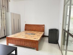 河池宜州宜州城区现代城附近 电梯1房1厨1卫 配冰箱洗衣机衣柜沙发出租房源真实图片