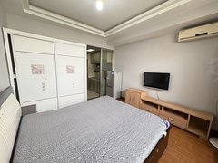 泗洪青阳街道顺河路银河国际公寓,有电梯,厨房卧室有隔断,家电家具齐全,出租房源真实图片