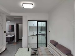 哈密伊州时代广场创业小区高层单身公寓 一室 家电齐全 拎包入住 1500月出租房源真实图片