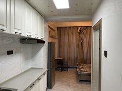 兴安盟乌兰浩特五一广场铭都商业广场综合楼 1室1厅1卫 电梯房 精装修 南北通透出租房源真实图片