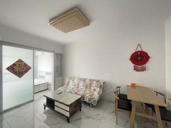 龙口西城区北马大街海岸华府,通透两室,半年起租,拎包可住停车方便出租房源真实图片