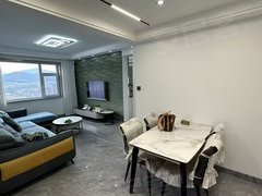 通化东昌万达广场大禹城邦江景房，2500包取暖物业，电梯20，三室一厅110出租房源真实图片