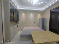 中卫沙坡头旅游购物广场一楼东方明珠小区精装修60平米，带家电家具出租房源真实图片