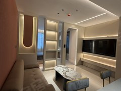 宜兴宜城宜城中心押一付一！万达，八佰伴旁，桔子公寓，一室两厅，奶油风。设施齐出租房源真实图片