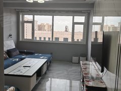 武威凉州丽达百货清华园带电梯小高层两室一厅一卫12楼。精装修家具家电齐全出租房源真实图片