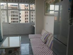 龙口东城区兰兴路公检法附近!中央公元 两室 南向 供暖好 家具家电齐全拎包住出租房源真实图片