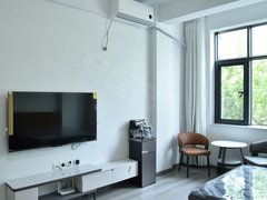 弥勒九号路庆来公园生态园 免物业费含网络有空调 温馨一室 拎包入住 租1000出租房源真实图片