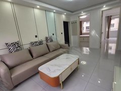 乳山市区商业街可半年租：金岭小区一楼71平北厅2室，全明家电齐月1500元出租房源真实图片