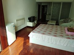 乳山银滩长江路海洋明珠小区 电梯海景房 可做饭 客卧一体年租 也可日租月租出租房源真实图片