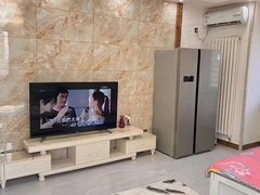 乌海海勃湾下海勃湾万达公寓精装58平,电梯高层全阳户型家具家电空调齐全出租房源真实图片
