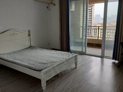 铜陵铜官万达广场此房位于万达底下紫金公馆，交通方便，大房间带阳台的出租房源真实图片