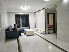 长垣南蒲华宇百货国贸中心住宅楼两室两厅一卫，拎包入住，年租15000元带暖气出租房源真实图片