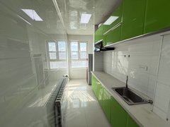 呼伦贝尔海拉尔河西出租火车站附近电梯两室家具家电齐全月租1200季度起租！出租房源真实图片