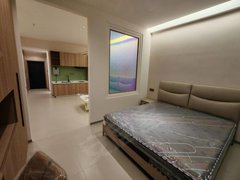 鄂尔多斯东胜市中心银泰国际精装修公寓出租，家电家具全新出租房源真实图片