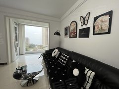 威海环翠大福源简约风格湾九里海景房两室两厅一卫一厨精装修环境好家电齐全拎包出租房源真实图片