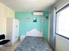 青岛城阳高新区卧室有空调 厨房有橱柜可做饭 中欧东六区 多套合租房出租房源真实图片