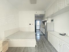 乳山银滩长江路乳山银龙湾北区电梯温馨一居室 空调冰箱洗衣机热水器都齐全出租房源真实图片