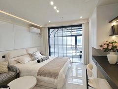 柳州鱼峰东环阳光一百精装奶油风单间 家电齐全 出行方便 可短租出租房源真实图片