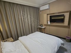 阿克苏阿克苏市阿克苏城区国色对面，银基王朝宾馆式公寓，独立卫生间有空调可月付费用全包出租房源真实图片