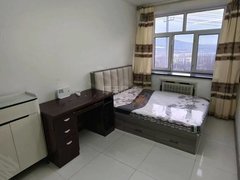 双鸭山尖山东山国际会展中心春晖小区2楼54平方中门，一室一厅，拎包入住，年租7000出租房源真实图片