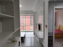 哈密伊州时代广场创业小区电梯房，单身公寓，拎包入住家具家电齐全出租房源真实图片