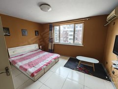 朝阳双塔大润发八里铺，豪德附近，盛世龙城小区4楼包取暖，客卧一体精装公寓出租房源真实图片