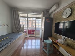 烟台芝罘幸福海港小区,临近海边,好楼层,家具家电齐全,生活交通方便!出租房源真实图片