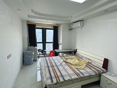 张家港塘市塘市中心吾悦广场公寓电梯房 一室一厅押一付一 拎包入住可短租停车方便出租房源真实图片