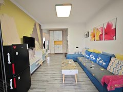 庆阳西峰西峰城区学院路学校四中附近,精装两居室,家具家电齐全,拎包入住。出租房源真实图片
