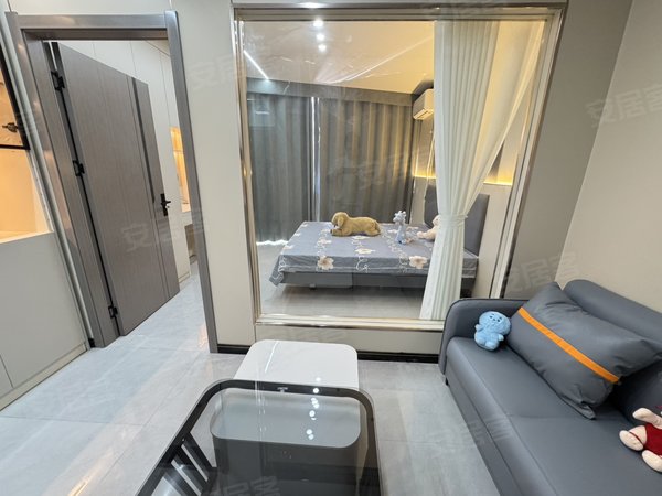 金华东阳东阳江北兴平东路115号楼人民路轻轨站 盛世豪门 落地窗一级空调 超大一室一厅带投影出租房源真实图片