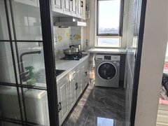 四平铁西九州市政府，阳光首府精装一居室年租12000包取暖物业出租房源真实图片