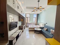 庆阳西峰西峰城区城南，万辉国际，精装电梯一居室，拎包入住，随时看房，家电齐全出租房源真实图片