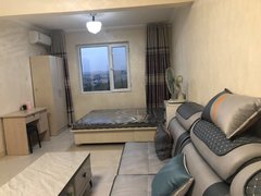 巴音郭楞库尔勒新市区光华上品单身公寓41平米带空调家具，家电都是新的1200月出租房源真实图片
