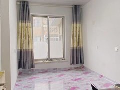 乳山市区商业街出租富山路贴地三楼两室，暖气液化气，家电齐全年租每月800出租房源真实图片