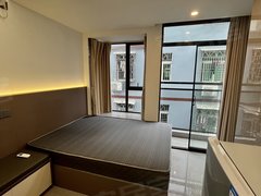 深圳宝安西乡12号宝田一路地铁阳台单间押一付一民水民电方便停车可养宠物出租房源真实图片
