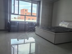 张掖甘州中心广场美意家公寓：位于张火公路东部建材市场对面水泥路50米处。出租房源真实图片