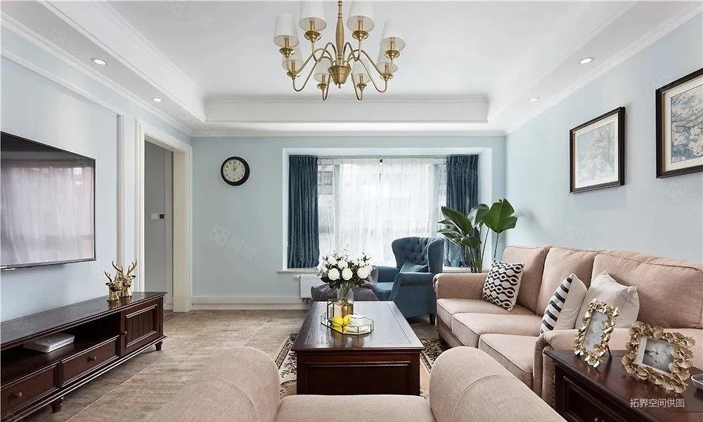 客厅整体以淡蓝色与白色为基调,营造清新明净的空间氛围