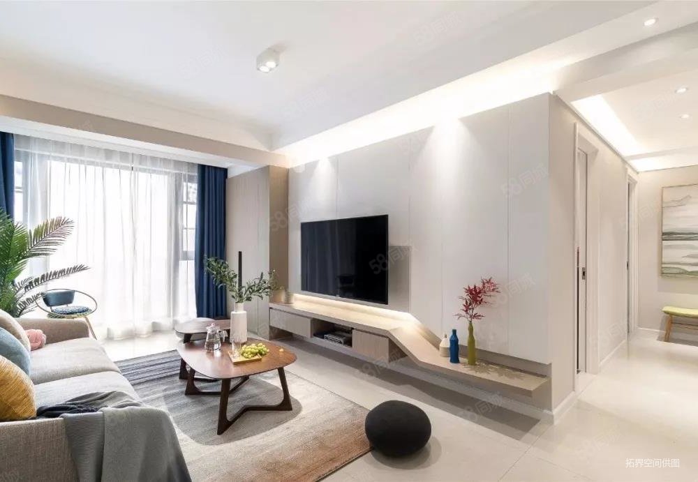 客厅电视墙以板材凸出的造型还做了背光,木质电视柜与左侧高柜相连